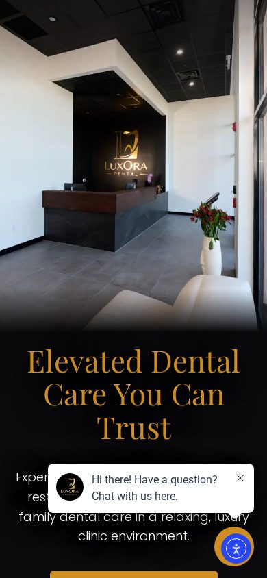 LuxOra Dental on a phone